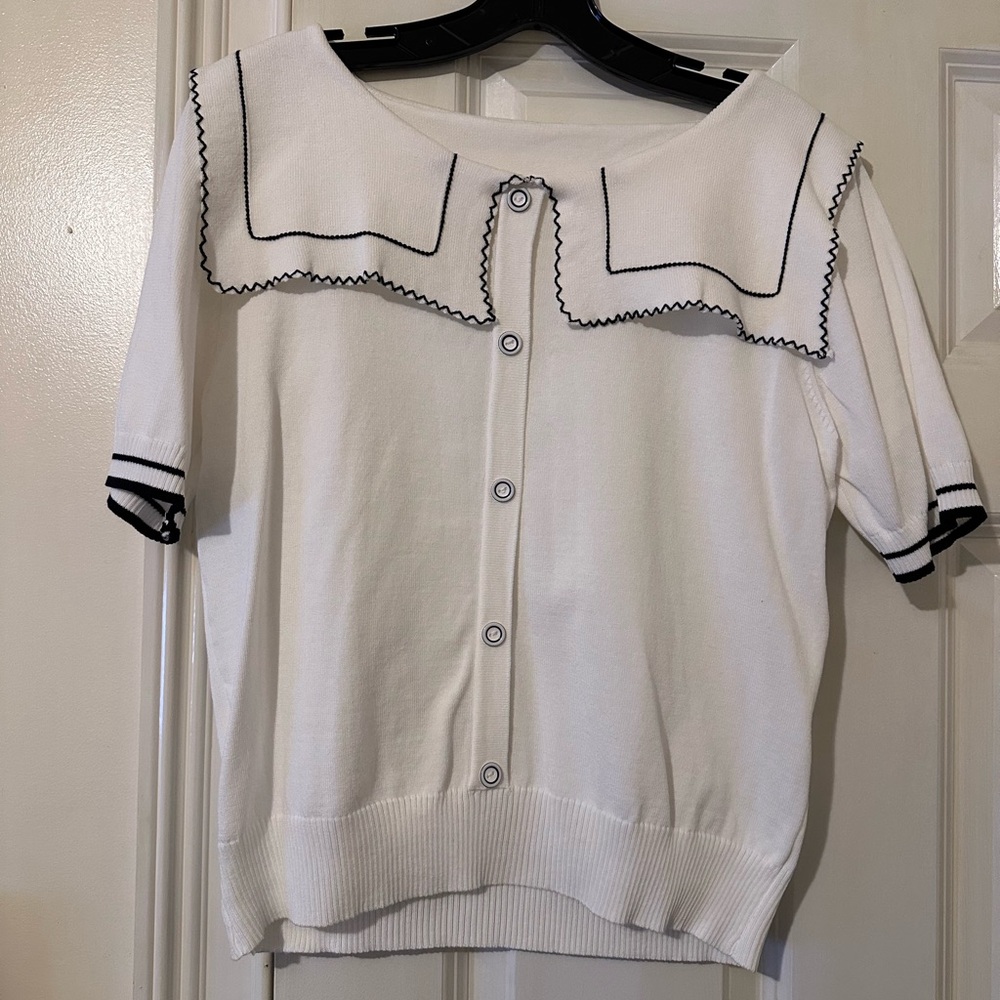 White Button-Up Sweater with Black Trim